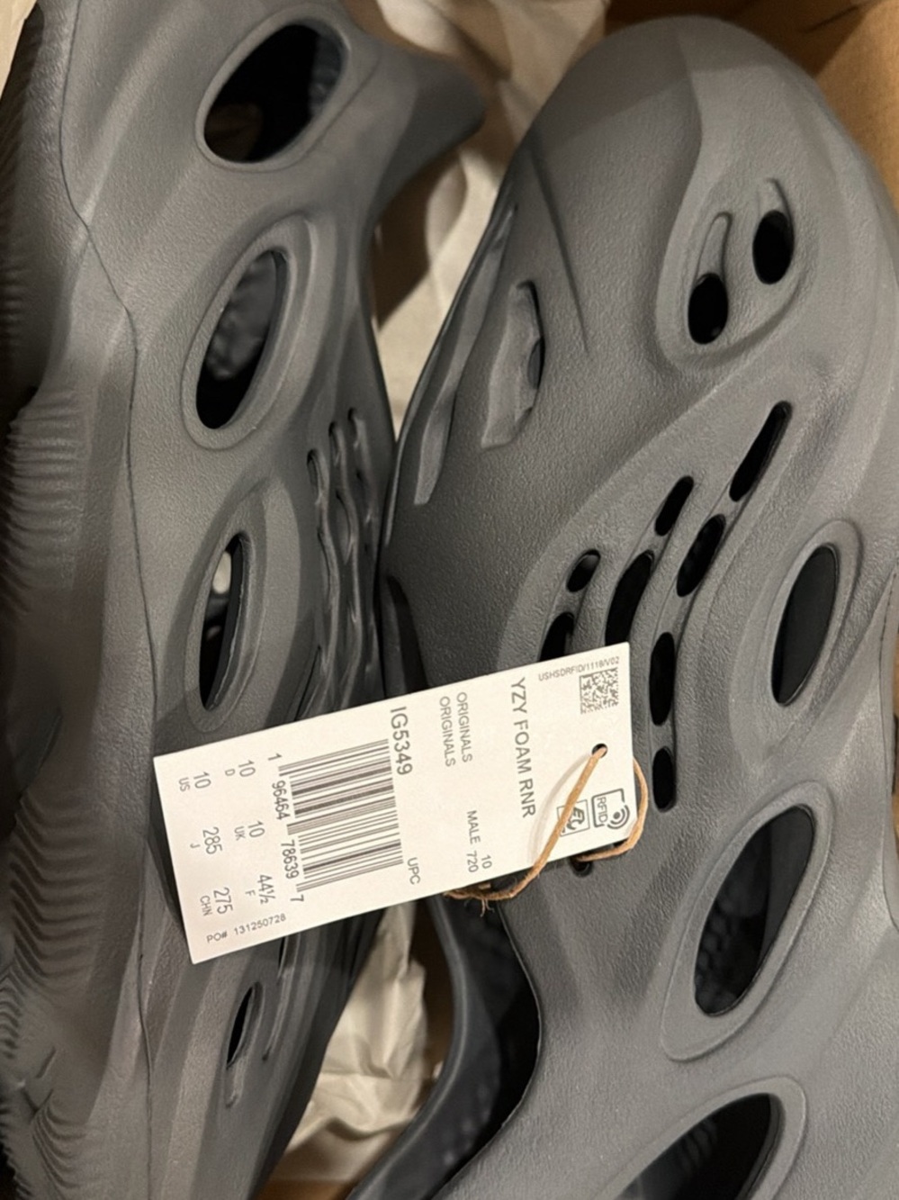 Box with brand tag